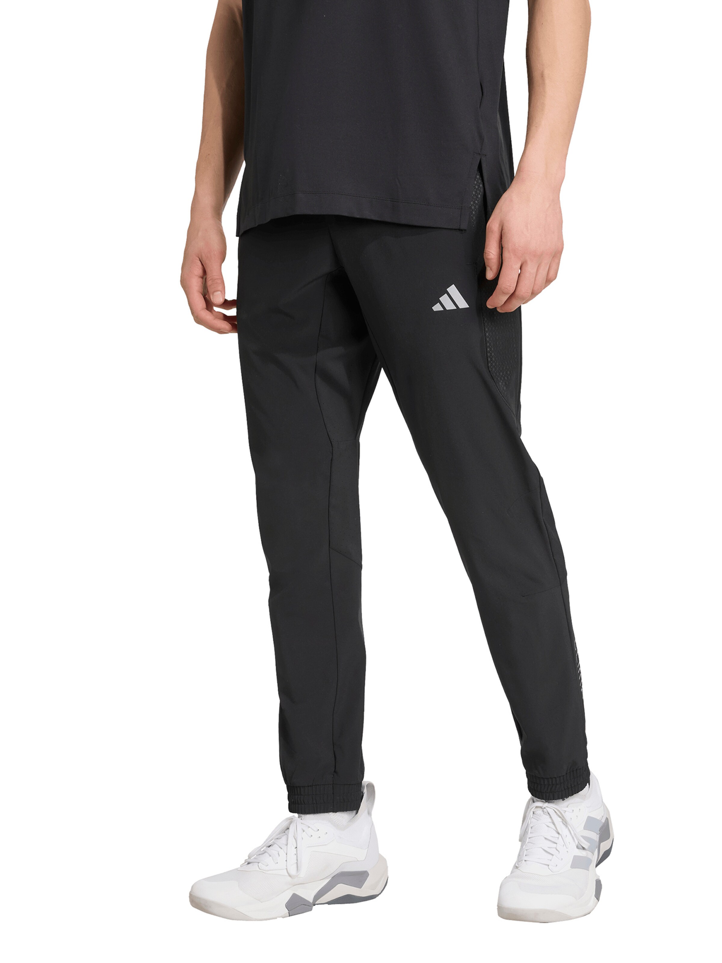 Tapered Pantaloni sportivi 'Tech Apparel' di ADIDAS PERFORMANCE in nero: frontale