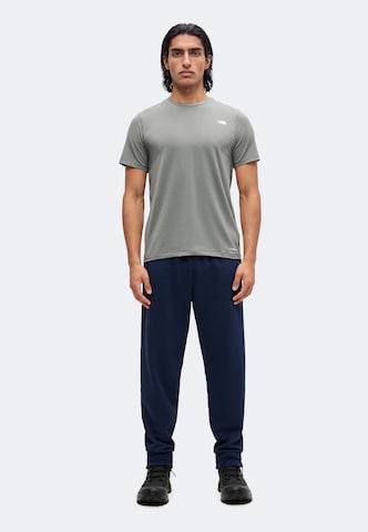 THE NORTH FACE Tapered Παντελόνι 'EVOLUTION SIMPLE DOME' σε μπλε