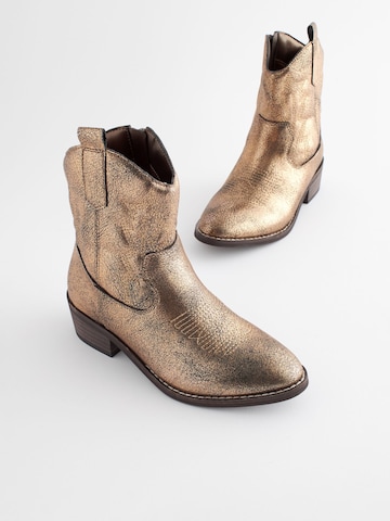 Next Stiefel in Gold