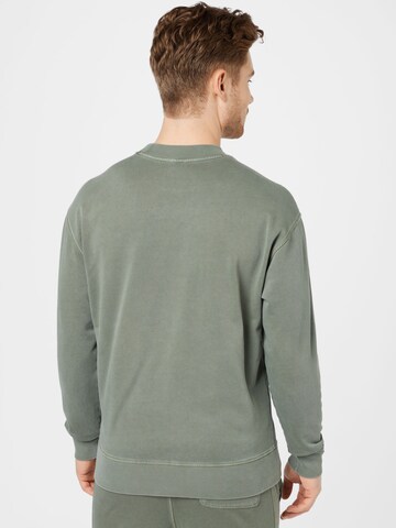 Sweat-shirt 'WEFADE' BOSS Orange en vert