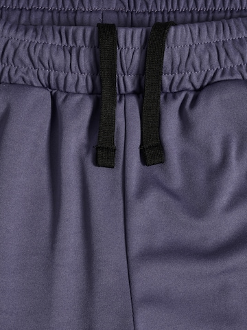 Hummel Regular Sports trousers in Purple