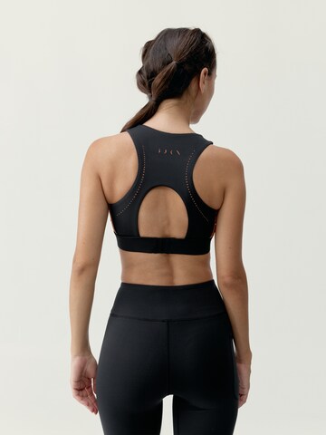 Born Sporttop ' Tao ' in Zwart