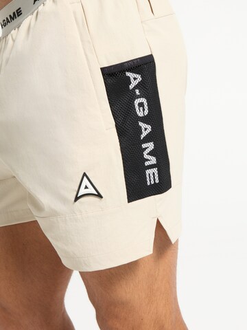 regular Pantaloni sportivi di A-Game in beige