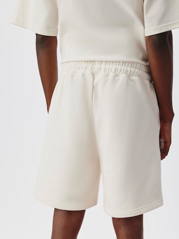 ABOUT YOU x Kingsley Coman Loose fit Pants 'Nathan' in White