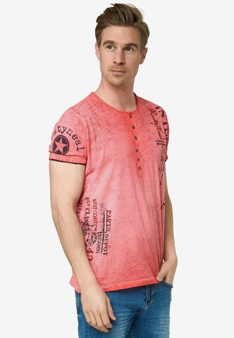 Rusty Neal T-Shirt mit seitlichem Druck in Rot: predná strana