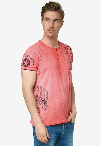 Rusty Neal T-Shirt mit seitlichem Druck in Rot: predná strana