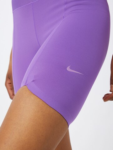 NIKE Skinny Workout Pants in Purple