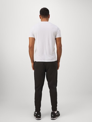 PUMA Funkčné tričko 'Tad Essentials' - Biela