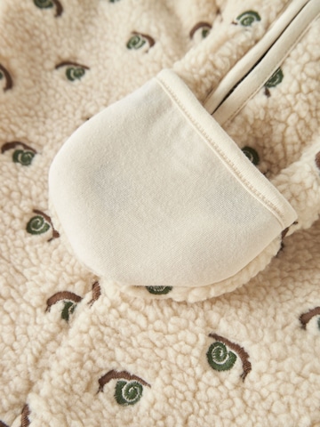 Lil'Atelier - Mono en blanco