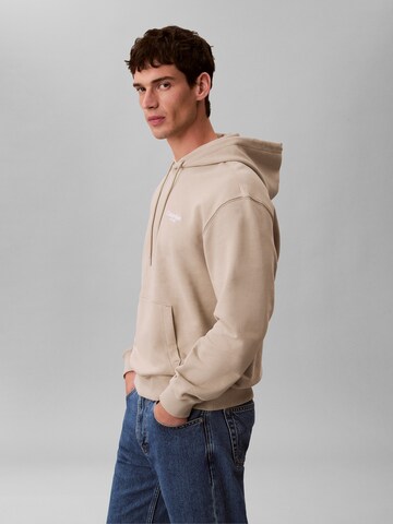 Calvin Klein Jeans Свитшот в Коричневый