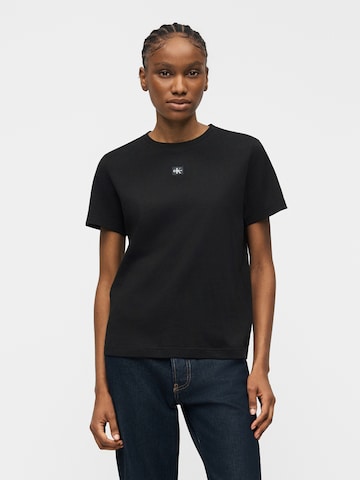 Tricou de la Calvin Klein Jeans pe negru: față