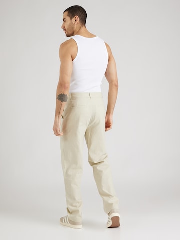 ABOUT YOU x Kevin Trapp Loose fit Pleat-Front Pants 'Kimi' in Beige