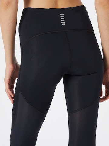 UNDER ARMOUR Skinny Sporthose in Schwarz