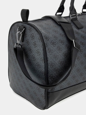 GUESS Reisetasche 'Ibiza' in Schwarz
