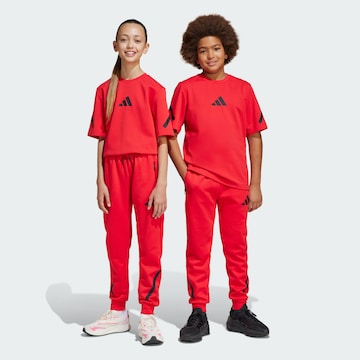 ADIDAS SPORTSWEAR Tapered Sporthose ' Z.N.E. ' in Rot: Vorderseite