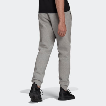 ADIDAS ORIGINALS Tapered Pants 'Adicolor Essentials Trefoil' in Grey