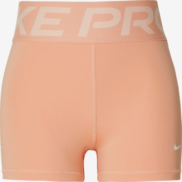 NIKESkinny Sportske hlače - narančasta boja: prednji dio