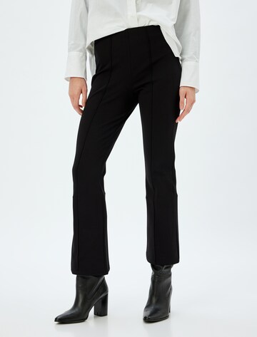 Koton Flared Trousers in Black: front