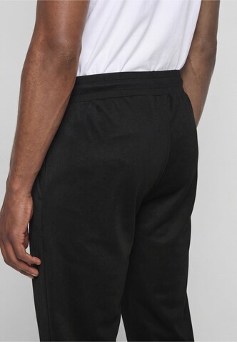Regular Pantalon de sport Sergio Tacchini en noir