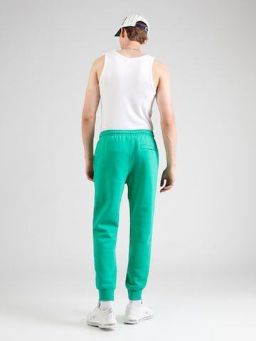Nike Sportswear Конический (Tapered) Штаны 'CLUB' в Зеленый