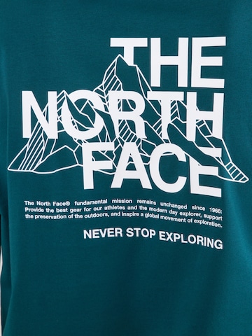 THE NORTH FACE Funkčné tričko 'MOUNTAIN' - Modrá