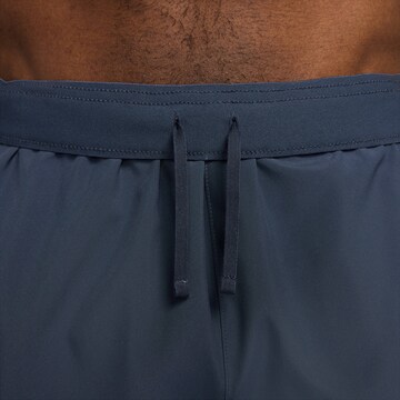 NIKE Regular Workout Pants in Blue
