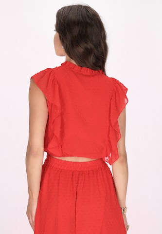 Camicia da donna di faina in rosso