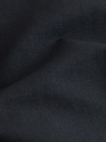 Next - Tapered Pantalón cargo en negro: frente
