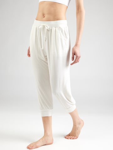 CURARE Yogawear - Tapered Calças de desporto em branco: frente