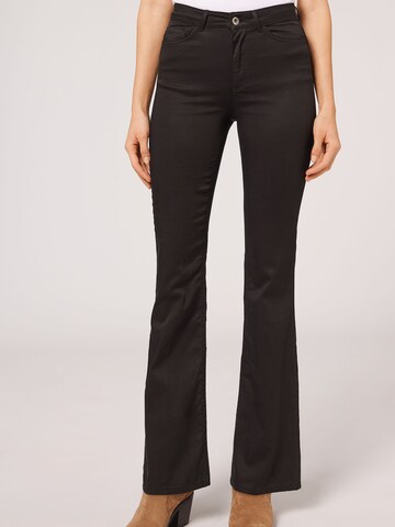 CALZEDONIA Flared Jeans in Black: front