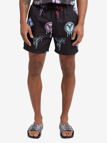 Carlo Colucci Board Shorts in Black: front