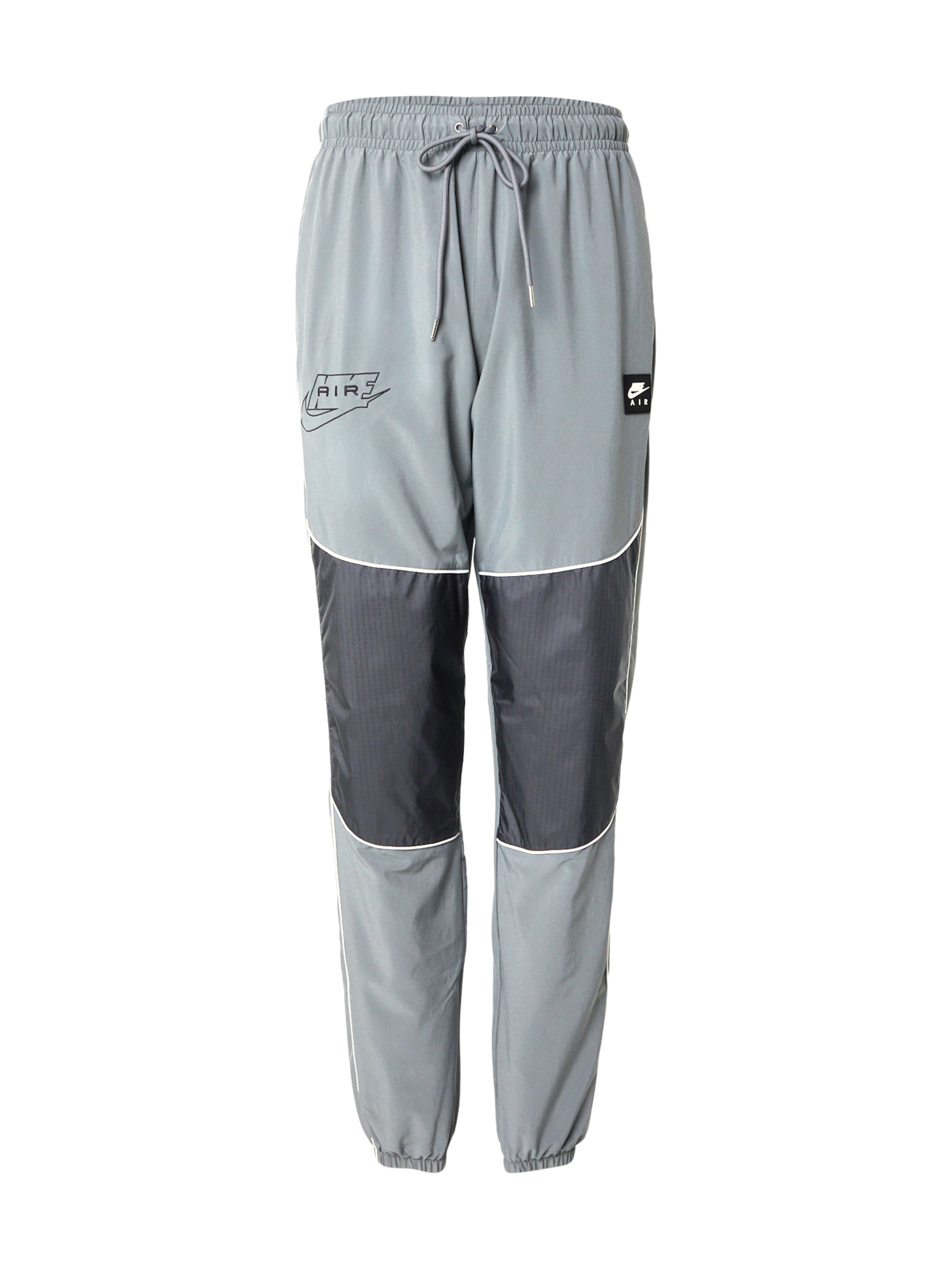 Nike Sportswear Zwężany krój Spodnie 'AIR' w kolorze szary: przód