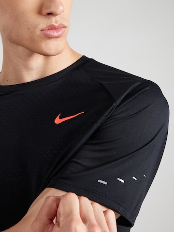 NIKE Funkčné tričko 'ENRGY STRIDE' - Čierna