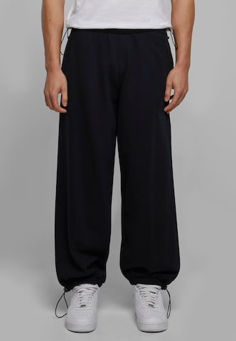 Urban Classics Loose fit Trousers in Black: front