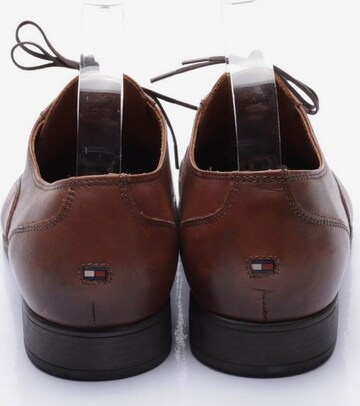 TOMMY HILFIGER Flats & Loafers in 43 in Brown