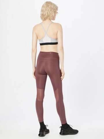 Skinny Pantalon de sport NIKE en rouge