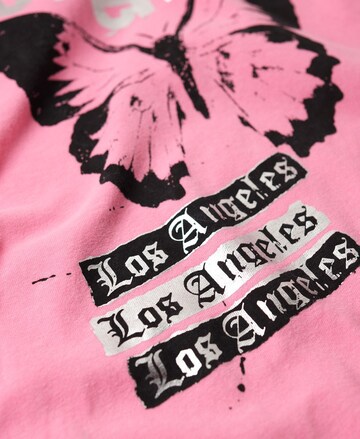 Superdry Koszulka 'Lo-fi Rock ' w kolorze różowy