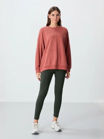 Sweat-shirt Tommy Life en rouge