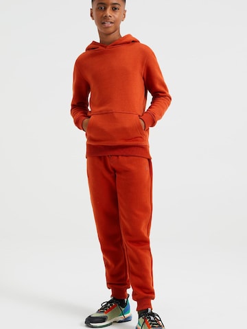 WE Fashion Zwężany krój Spodnie w kolorze pomarańczowy