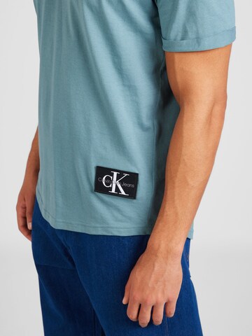 Tricou de la Calvin Klein Jeans pe albastru