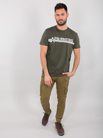 Tapered Pantaloni cargo 'Combat' di ALPHA INDUSTRIES in verde