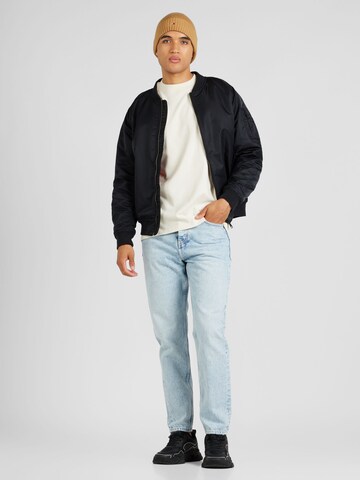 Tommy Jeans Tričko – béžová