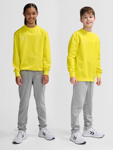 Hummel Athletic Sweatshirt 'GO 2.0' in Yellow: front