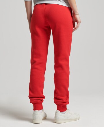 Effilé Pantalon 'Vintage Collegiate' Superdry en rouge