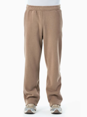 Organication Loose fit Pants in Brown: front