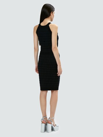 Top in maglia di Influencer in nero