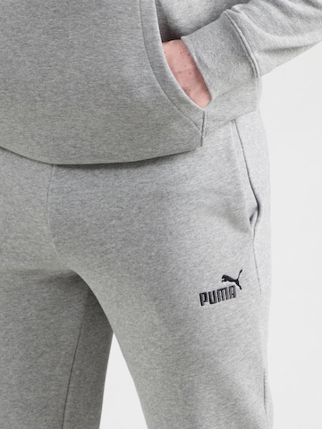 PUMA Конический (Tapered) Спортивные штаны 'ESS No. 1' в Серый