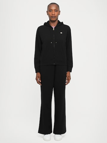 Tuta da jogging di EA7 Emporio Armani in nero: frontale