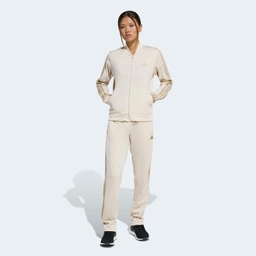 ADIDAS SPORTSWEAR Тренировочный костюм 'Essentials' в Бежевый: спереди