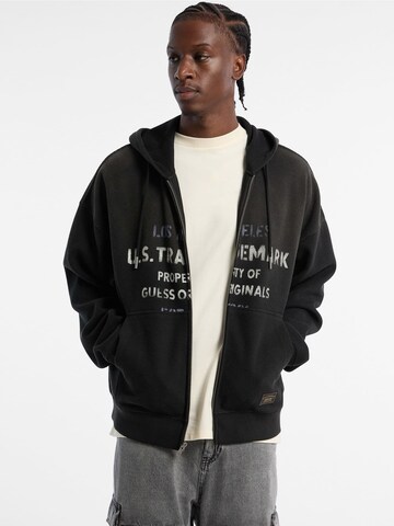 GUESS Sweatjacke in Schwarz